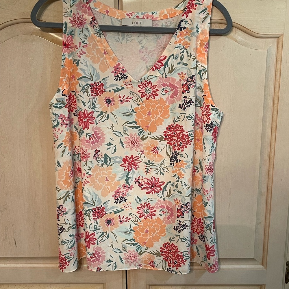 Lovely flowers in so many summer colors! Loft size L sleeveless top.